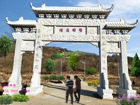 农村村口石门楼最新报价多少钱?村牌楼价格大全